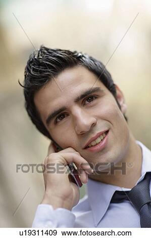 Business man on phone View Large Photo Image Stock Photo - Business man on phone. Fotosearch