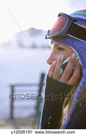 Stock Photo - Girl talking on phone. Fotosearch