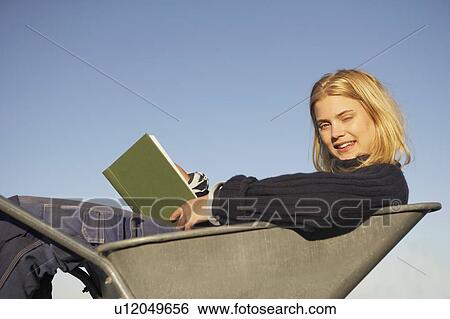 Stock Photograph - Young Woman relaxing.. Fotosearch