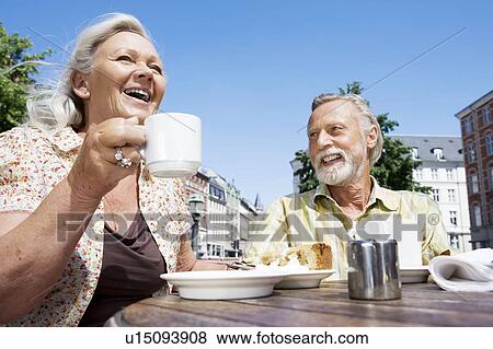 Stock Photo - Couple drinking coffee. Fotosearch