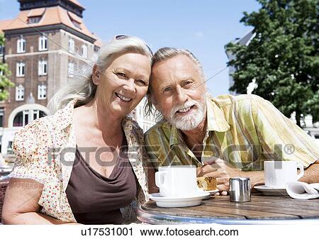 Stock Image - Couple smiling at camera. Fotosearch