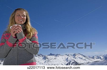Stock Image - Girl with cup of tea. Fotosearch
