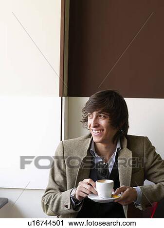 Portrait of teenage male with coffee cup View Large Photo Image Stock Image - Portrait of teenage male with coffee cup. Fotosearch