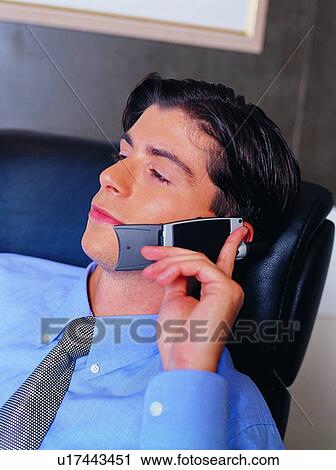 Stock Image - Black Hair, Businessman, Close-Up, Connection. Fotosearch