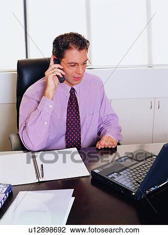 Stock Image - Book, Brown Hair, Businessman. Fotosearch
