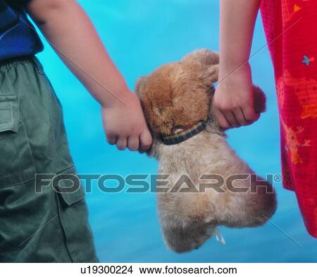 cloth, hands, background, children, toy View Large Photo Image Picture - cloth, hands, background, children, toy. Fotosearch