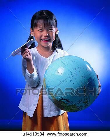 Picture - globe, background, children, girl, paper airplane, smile. Fotosearch