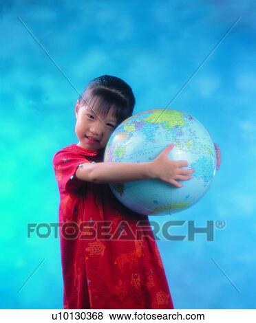 Stock Photo - globe, light, girl, background, children, smile. Fotosearch