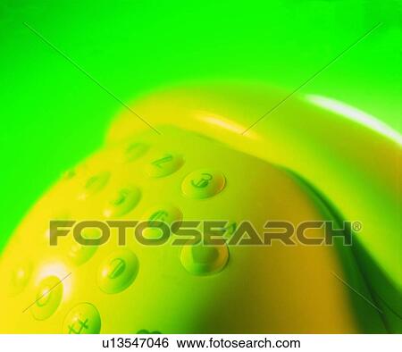 Stock Photograph - keystroke, yellow, telephone, light, shadow. Fotosearch