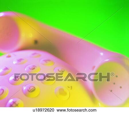 Stock Image - telephone, microphone, keystroke, light, pink, green. Fotosearch