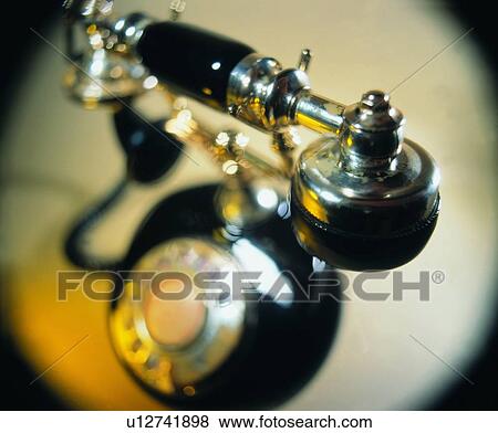Stock Photo - telephone, shadow, light, wire, antique. Fotosearch