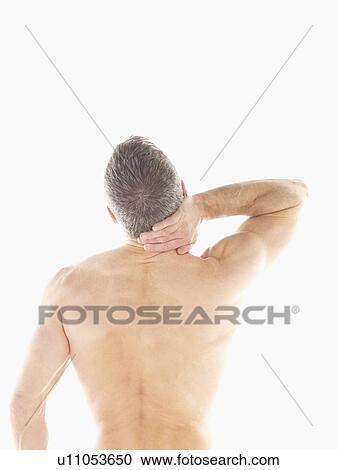 Mature man rubbing neck View Large Photo Image Stock Image - Mature man rubbing neck. Fotosearch
