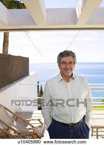 Stock Image - Portrait of mature man. Fotosearch