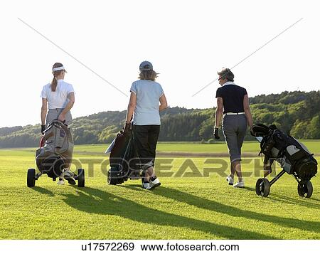 Three women on fairway View Large Photo Image Stock Photo - Three women on fairway. Fotosearch