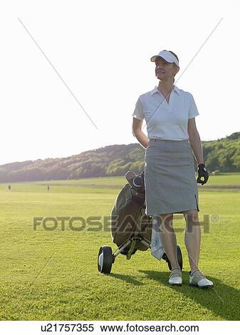 Woman at fairway View Large Photo Image Stock Photography - Woman at fairway. Fotosearch