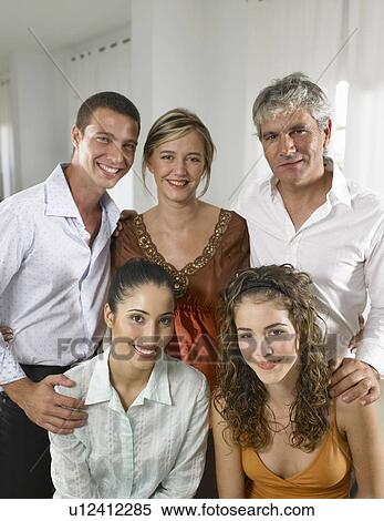 Stock Photography - Family portrait at home. Fotosearch
