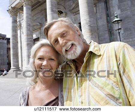 Stock Photo - Portrait of couple in front of church. Fotosearch