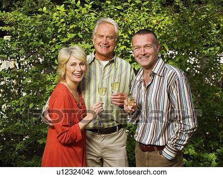 Portrait of senior woman with two men View Large Photo Image Stock Image - Portrait of senior woman with two men. Fotosearch