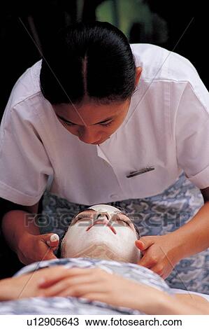 Stock Image - eyes closed, face pack, body care, therapeutic, spa treatment, women, idyllic. Fotosearch
