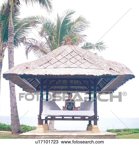 hut, cross legged, spa, exercising, sitting, square, culture View Large Photo Image Stock Image - hut, cross legged, spa, exercising, sitting, square, culture. Fotosearch