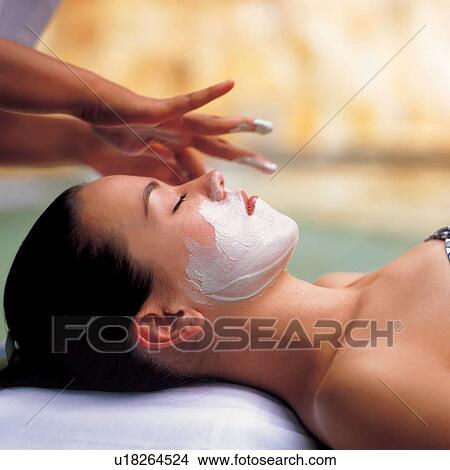 Picture - indulgence, leisure activity, culture, rub, beauty, pampering, face pack. Fotosearch