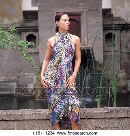 Picture - standing, care, one person, treatment, indulgence, silence, fashion. Fotosearch