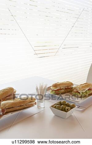 Stock Photo - Sandwiches on table in café. Alicante, Spain.. Fotosearch