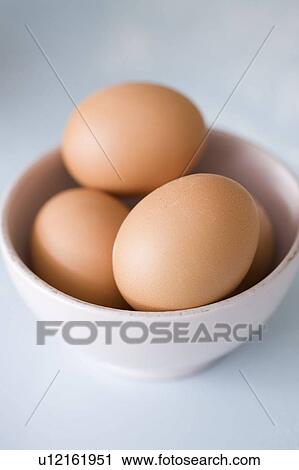 Stock Image - Still-life eggs in a bowl. Fotosearch