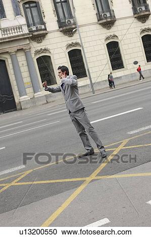 Business man waiting for cab View Large Photo Image Stock Image - Business man waiting for cab. Fotosearch
