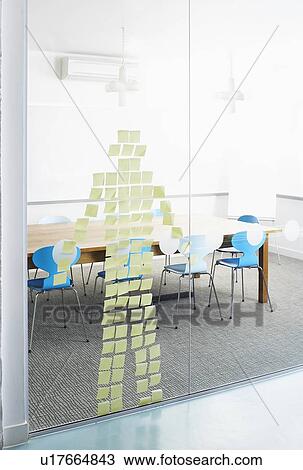 Post-Its stuck on glass wall in the shape of a human View Large Photo Image Stock Image - Post-Its stuck on glass wall in the shape of a human. Fotosearch