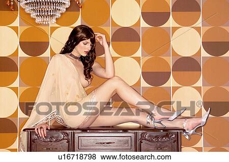 Stock Photo - Brown Hair, Cabinet, Cape, Chandelier, Choker. Fotosearch