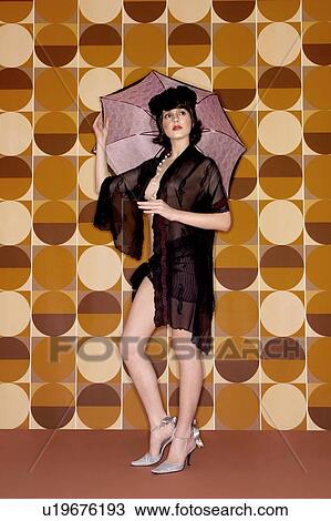 Stock Image - Short Hair, One Young Woman Only, Desire, Hat. Fotosearch