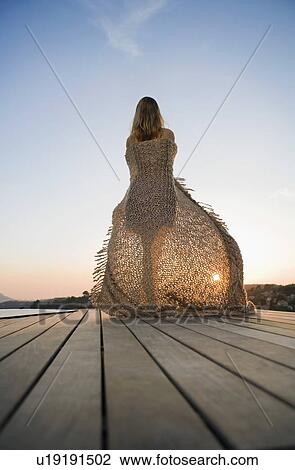 Woman standing on terrace back view. View Large Photo Image Stock Image - Woman standing on terrace back view.. Fotosearch