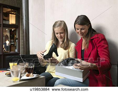 Picture - Mother and daughter shopping. Fotosearch