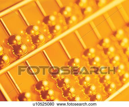 Stock Image - close-up, gold abacus, embellishing, device, ornate, clean, crafts. Fotosearch