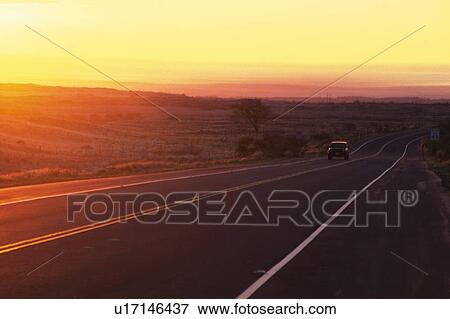 a Country Road By Sunset, A Car Driving on The Road, Side View View Large Photo Image Stock Photo - a Country Road By Sunset, A Car Driving on The Road, Side View. Fotosearch