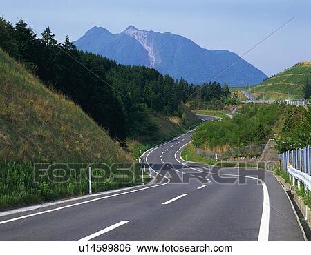 a Curvy Road In Front of Mt. Yuhu, High Angle View, Oita Prefecture, Japan View Large Photo Image Stock Photograph - a Curvy Road In Front of Mt. Yuhu, High Angle View, Oita Prefecture, Japan. Fotosearch