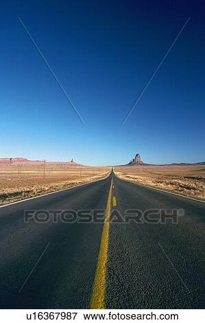 a Road at Monument Valley Under a Deep Blue Sky, Front View, Arizona, USA View Large Photo Image Stock Photo - a Road at Monument Valley Under a Deep Blue Sky, Front View, Arizona, USA. Fotosearch