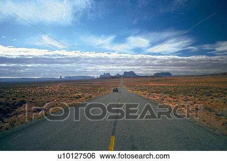 a Road at Monument Valley Under a Deep Blue Sky, Front View, Arizona, USA View Large Photo Image Stock Photograph - a Road at Monument Valley Under a Deep Blue Sky, Front View, Arizona, USA. Fotosearch