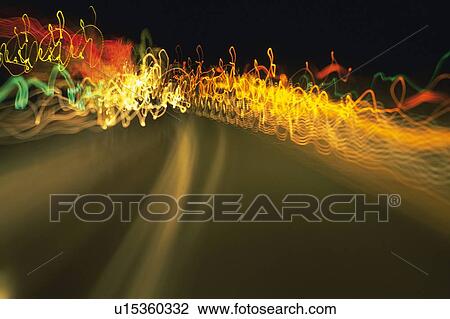 a Road, illuminated, Blurred Motion, Long Exposure View Large Photo Image Stock Image - a Road, illuminated, Blurred Motion, Long Exposure. Fotosearch