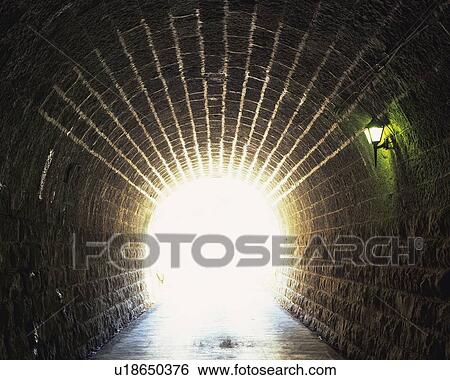 Stock Photograph -  a Tunnel, Made of Stone Bricks, the Outside Light Visible, Front View, Shizuoka Prefecture, Japan. Fotosearch