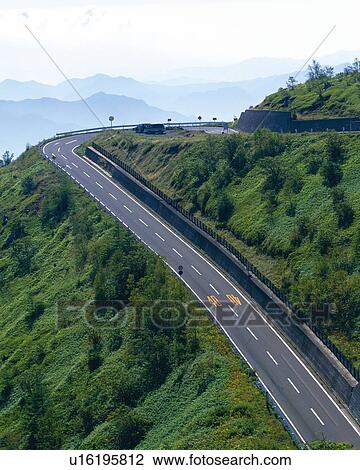 the Kusatsushirone Road, Surrounded By Several Green Hills and Mountains, High Angle View, Gunma Prefecture, Japan View Large Photo Image Stock Image - the Kusatsushirone Road, Surrounded By Several Green Hills and Mountains, High Angle View, Gunma Prefecture, Japan. Fotosearch