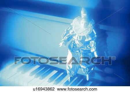 Piano and pierrot View Large Photo Image Stock Image - Piano and pierrot. Fotosearch