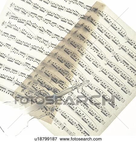 Stock Photo - Score and violin, miniature. Fotosearch