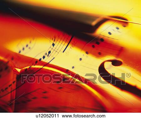 Stock Image - Violin and score. Fotosearch
