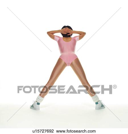 A woman in Leotard exercising, Rear View, Copy Space View Large Photo Image Stock Image - A woman in Leotard exercising, Rear View, Copy Space. Fotosearch