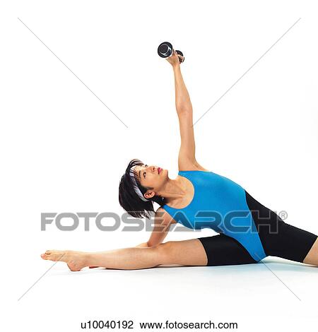 A woman in Leotard exercising with a dumbbell, Front View, Copy Space View Large Photo Image Stock Image - A woman in Leotard exercising with a dumbbell, Front View, Copy Space. Fotosearch