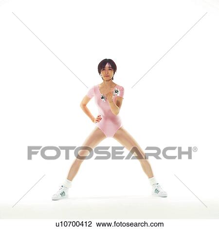 A woman in Leotard exercising with a dumbbell, Front View, Copy Space View Large Photo Image Stock Image - A woman in Leotard exercising with a dumbbell, Front View, Copy Space. Fotosearch