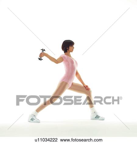 A woman in Leotard exercising with a dumbbell, Side View, Copy Space View Large Photo Image Stock Image - A woman in Leotard exercising with a dumbbell, Side View, Copy Space. Fotosearch