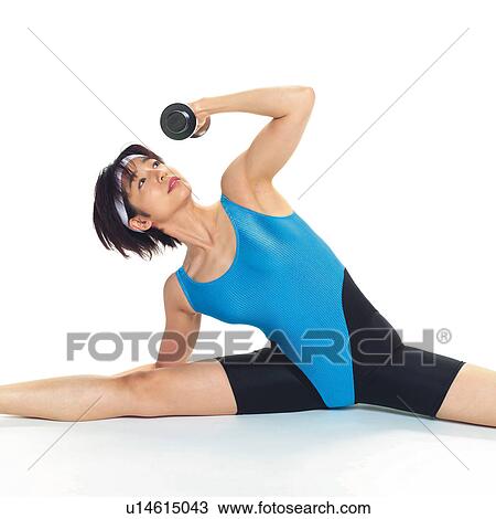 A woman in Leotard exercising with a dumbbell, Front View View Large Photo Image Stock Image - A woman in Leotard exercising with a dumbbell, Front View. Fotosearch
